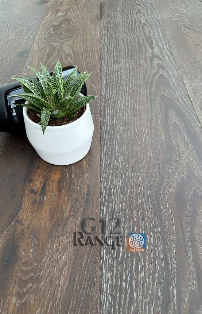 dark-brushed-oak-flooring-bedroom.webp - brushed dark oak plank flooring in a bedroom