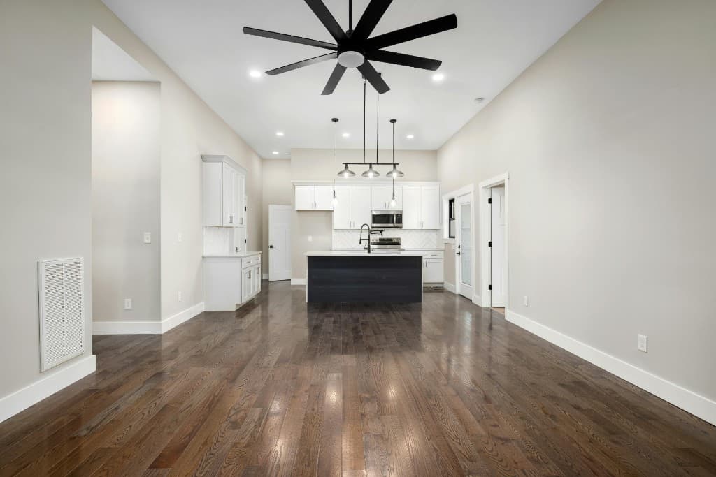 Herringbone wood flooring in a contemporary London open-plan living space